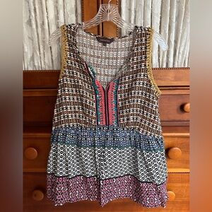 Anthropologie sleeveless top. Fun detail on sleeves and front.